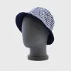 Umbro Mens Diamond Reversible Bucket Hat Navy/White _ 169220 _ Navy sold by Tekkie Town