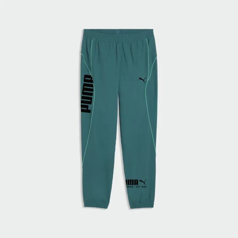 Puma Mens Sport Woven Track Pants Green made by Puma