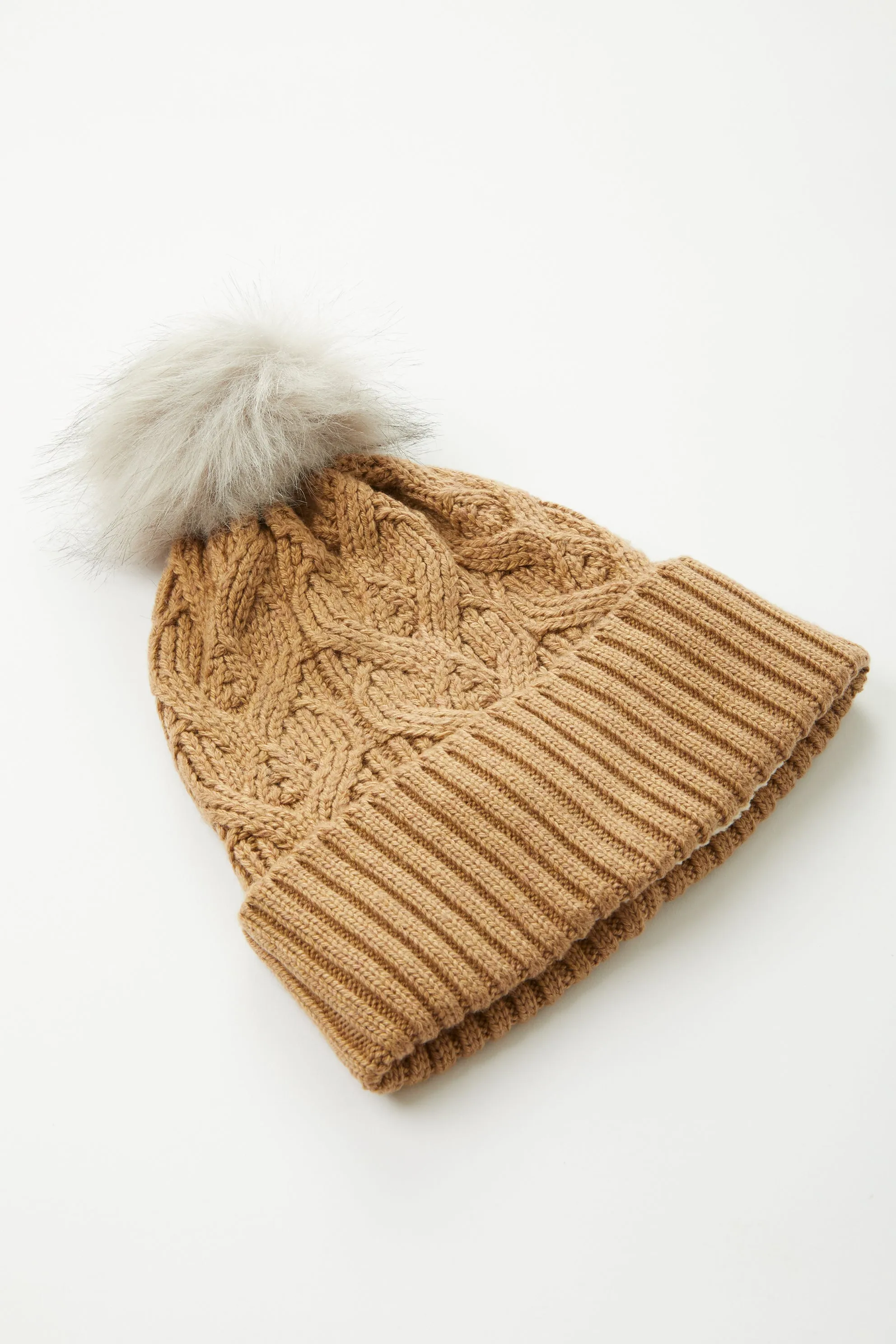 Loopy Cable Pom Hat sold by Mixology