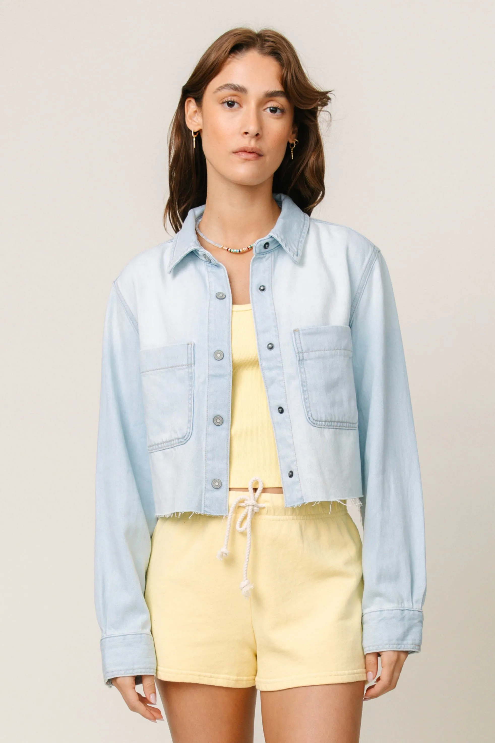 Light Wash Denim Button Front sold by Mixology