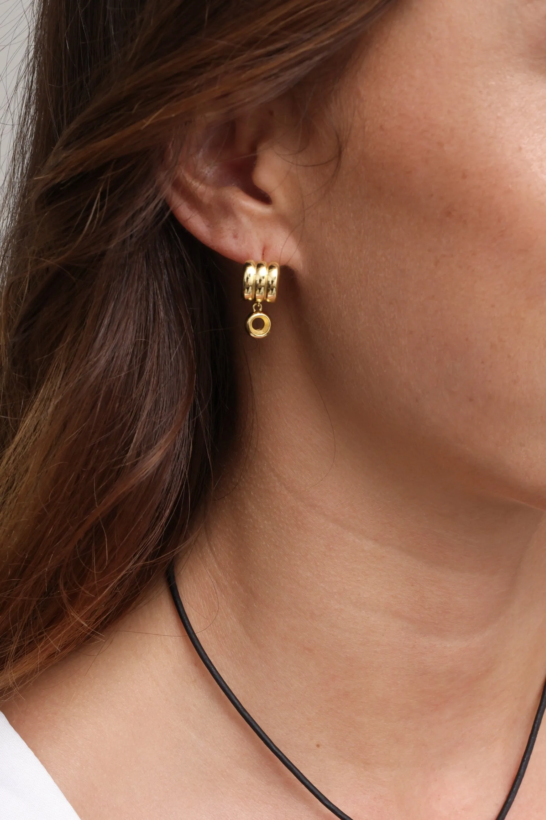 Huggie with Drop Bezel sold by Mixology