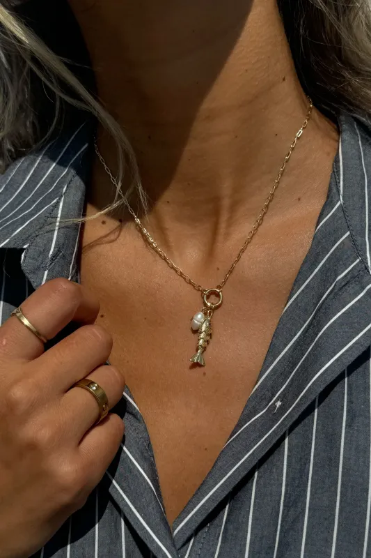 Coral Fish with Pearl Necklace sold by Mixology