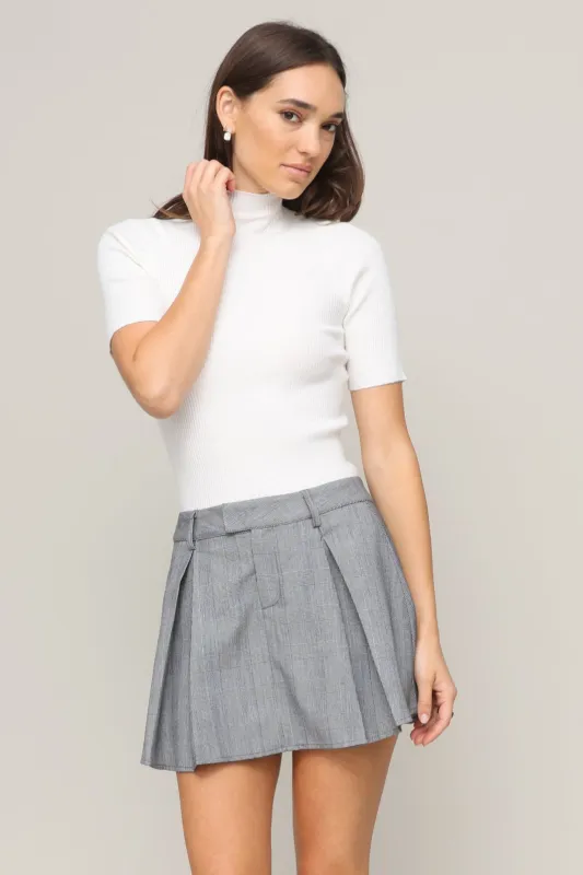 Rebecca Ribbed Mock Neck Sweater sold by Mixology