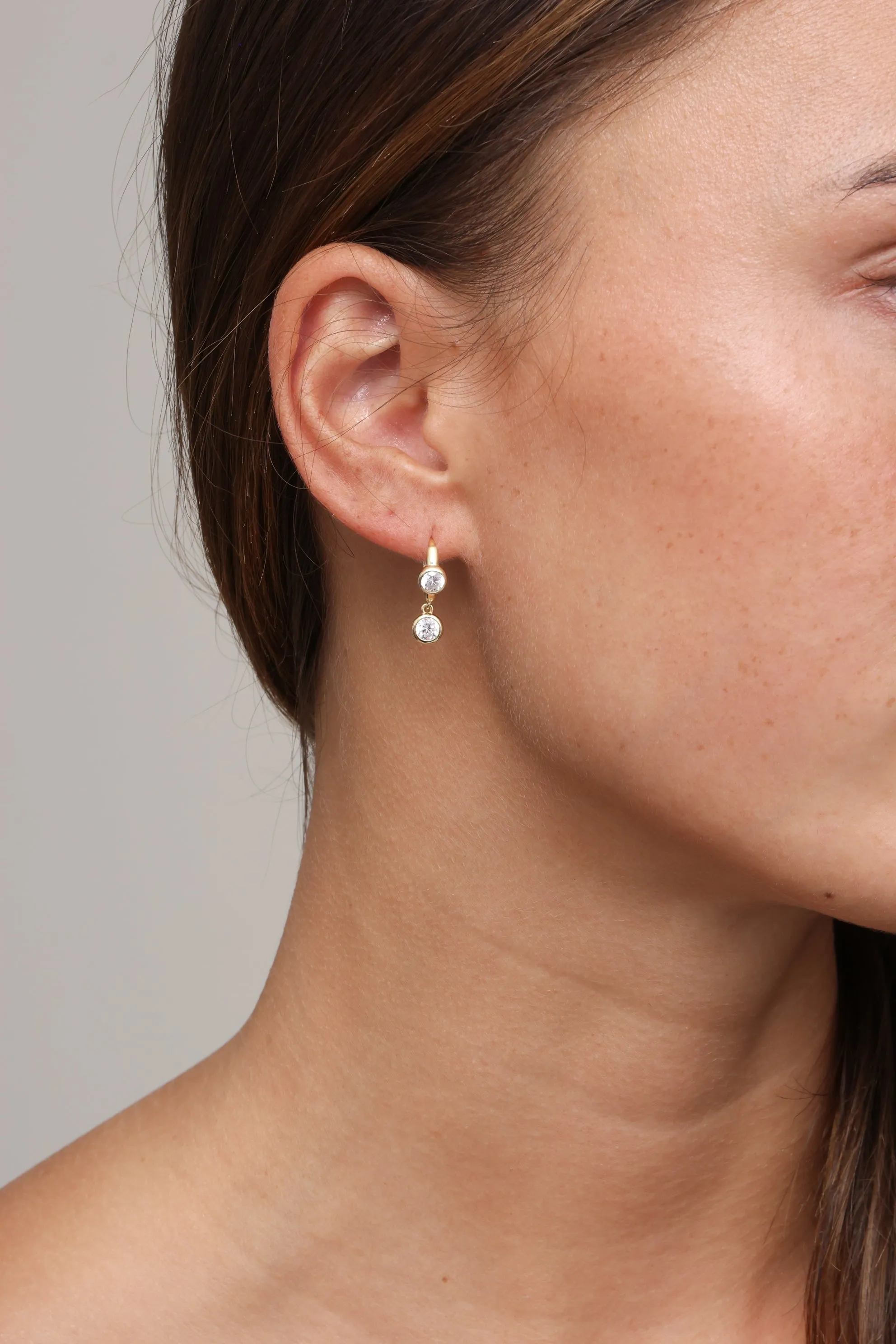 Noor Bezel Drop Huggie sold by Mixology