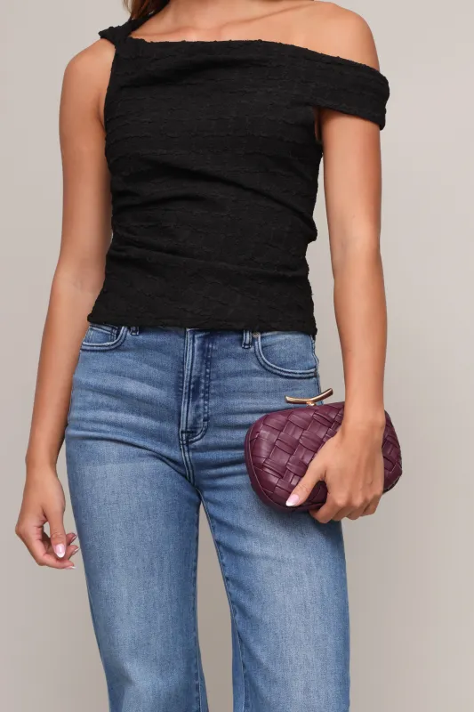 Rya Woven Clutch sold by Mixology