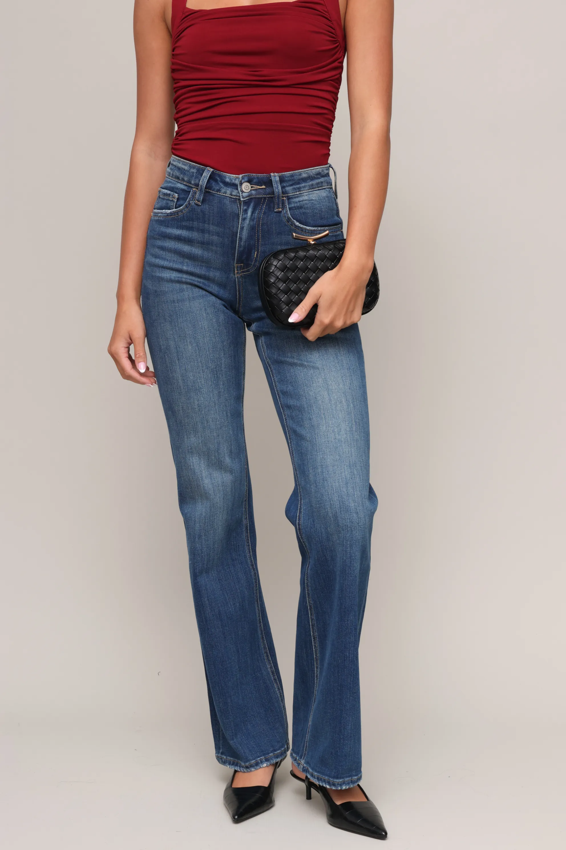 Rya Woven clutch sold by Mixology