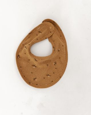 flower bib sold by Kindly