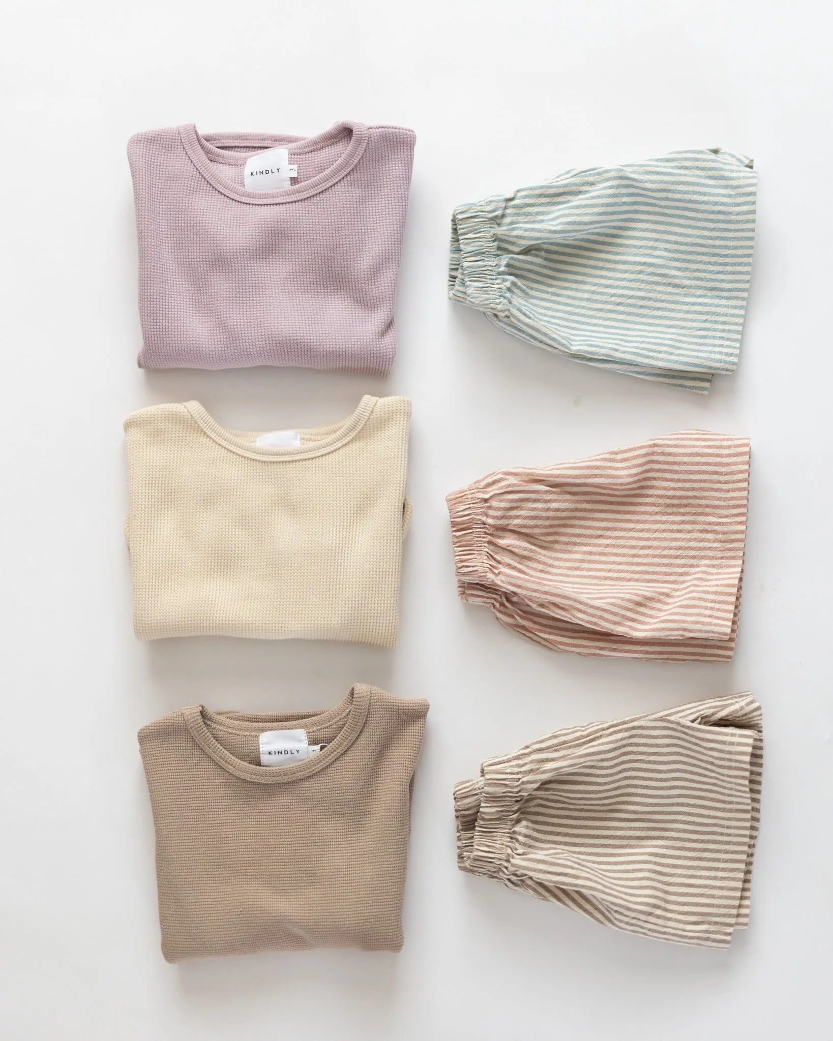 g. character waffle top sold by Kindly