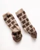 house socks sold by Kindly