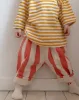 circus tent pants sold by Kindly