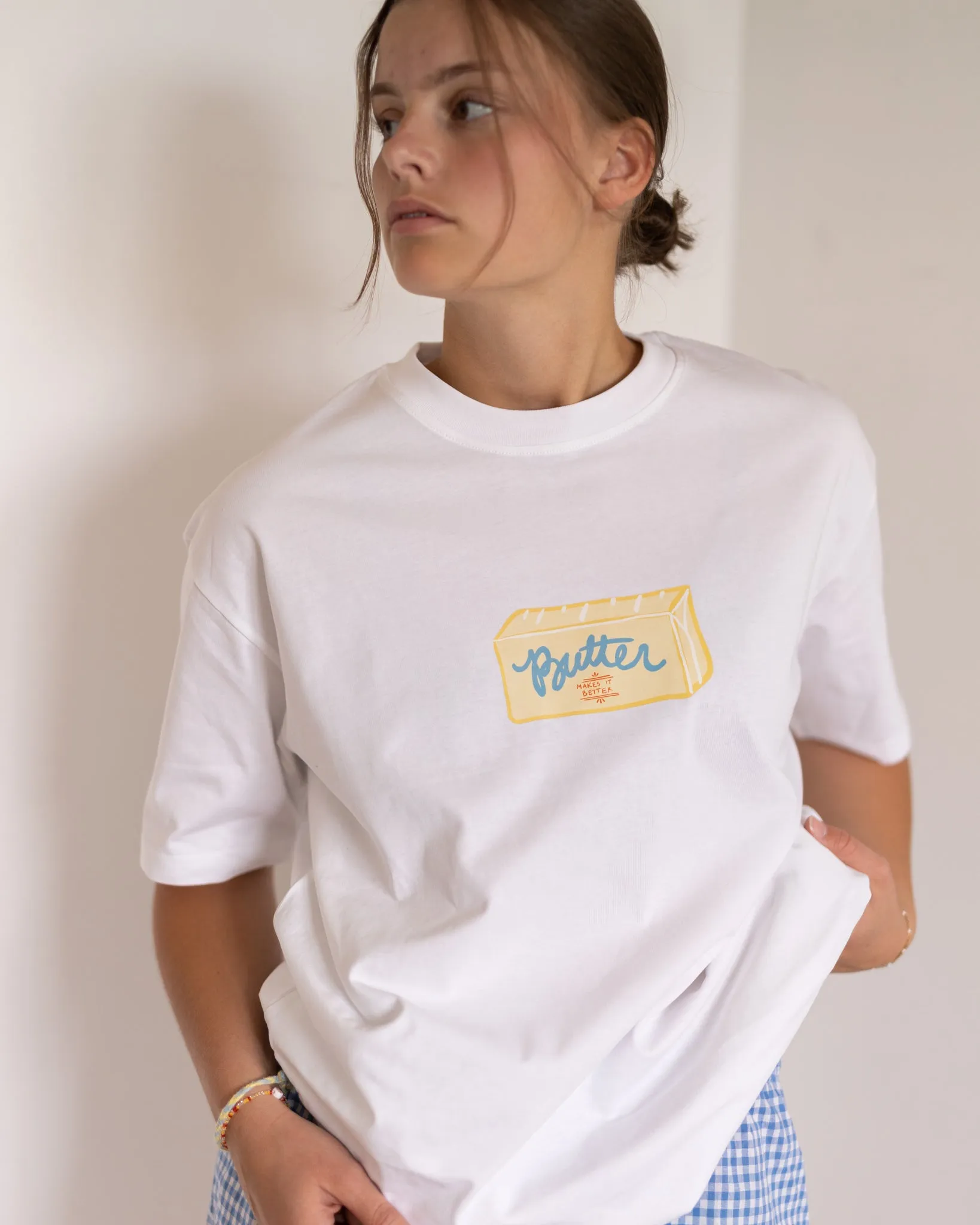 womans butter stick tee sold by Kindly