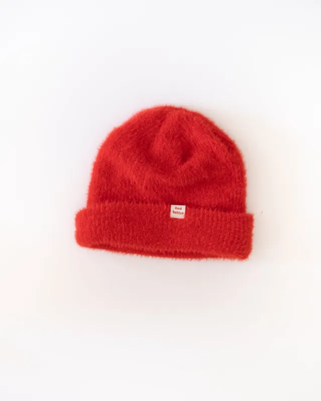 fuzzy beanie sold by Kindly