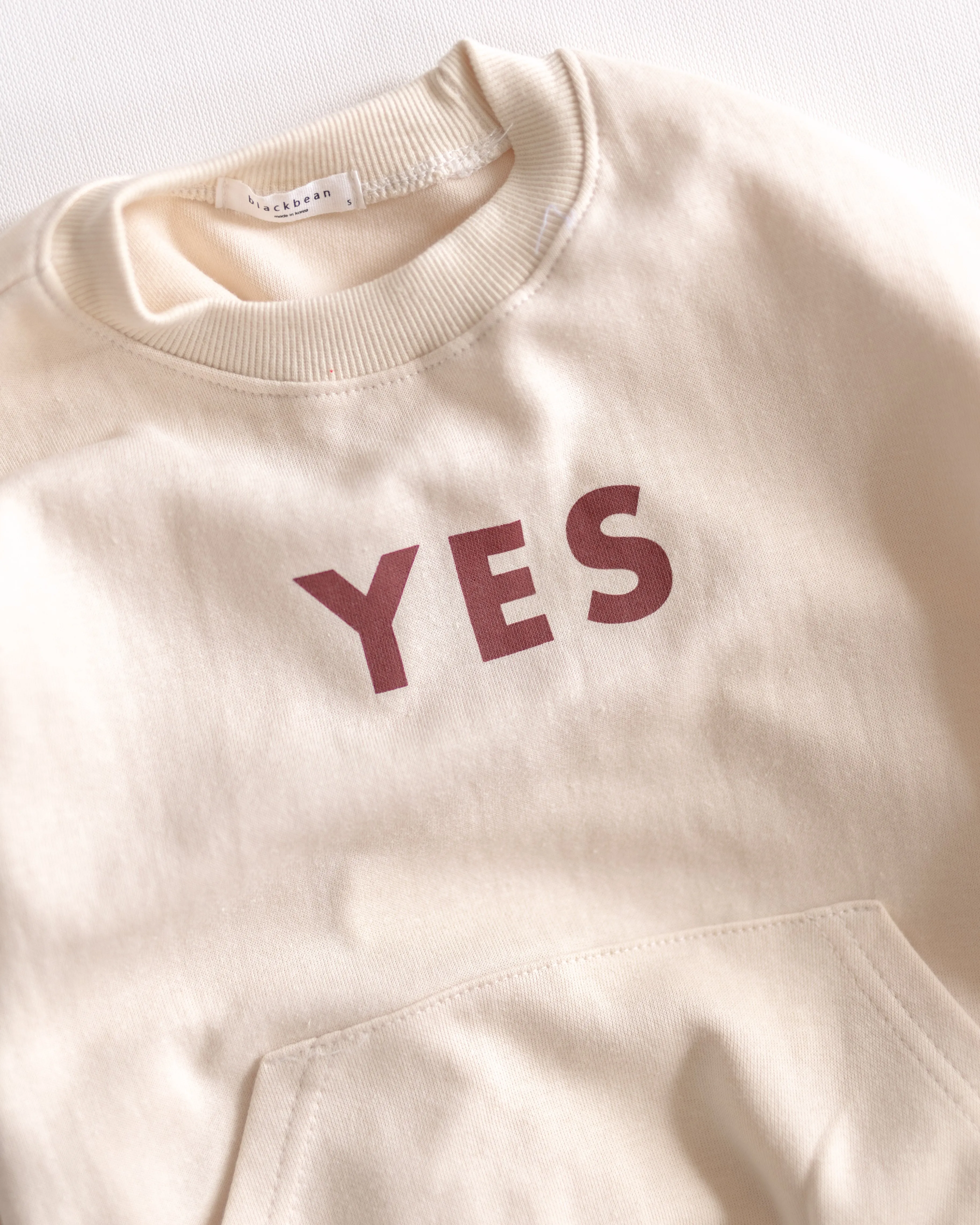 yes sweater sold by Kindly
