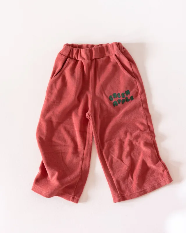 green apple trackies sold by Kindly