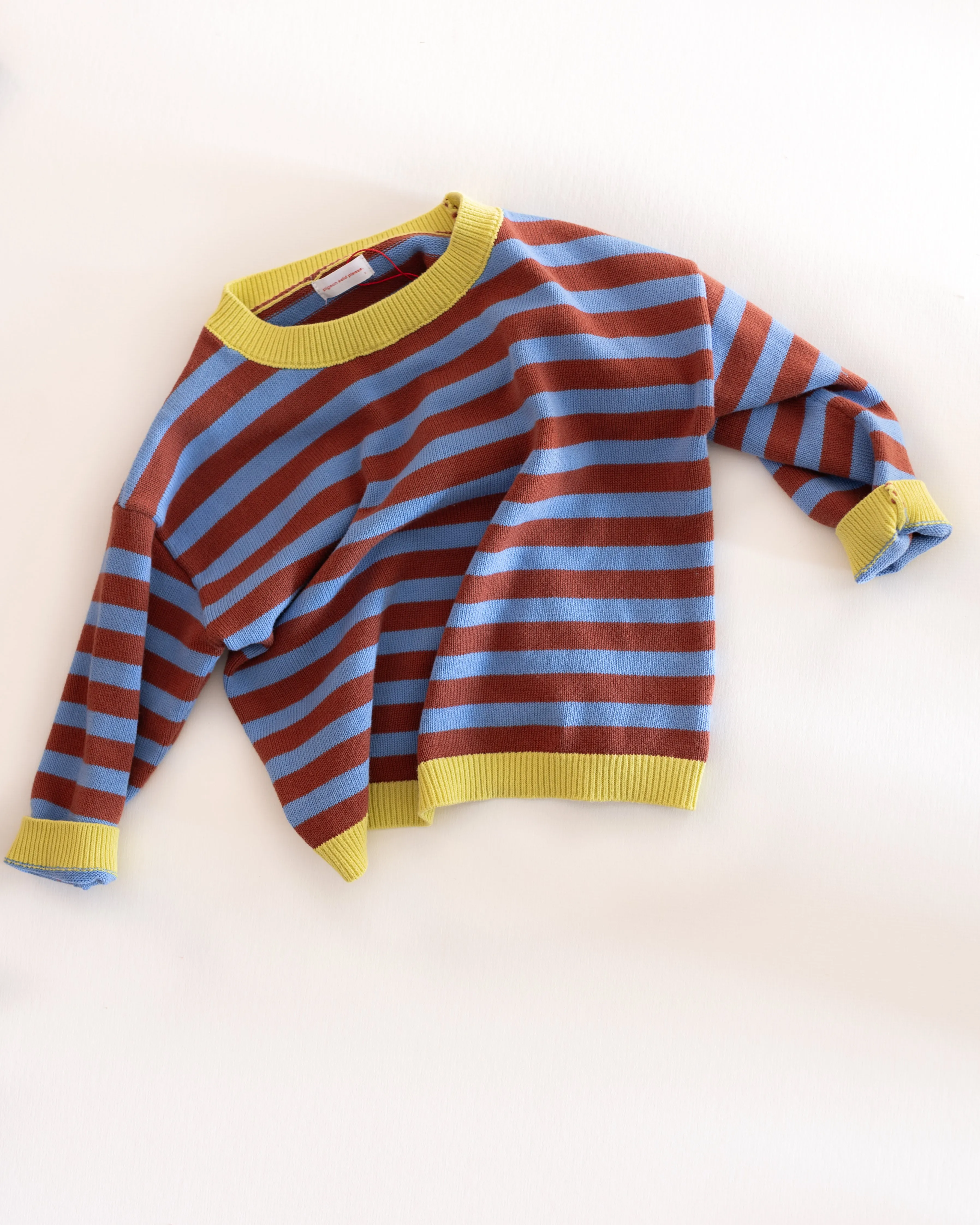stripe knit pullover sold by Kindly