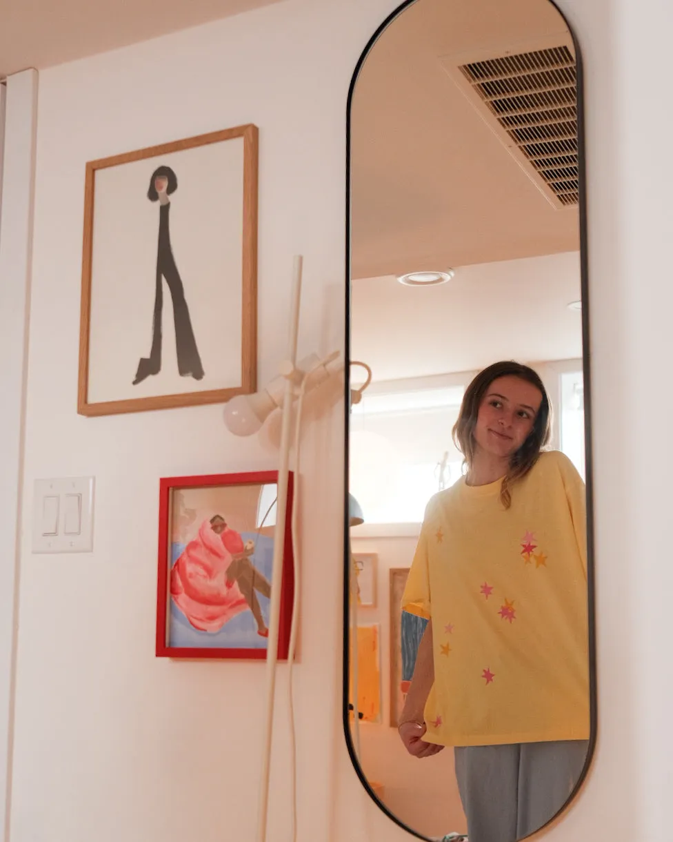 woman's starry tee sold by Kindly