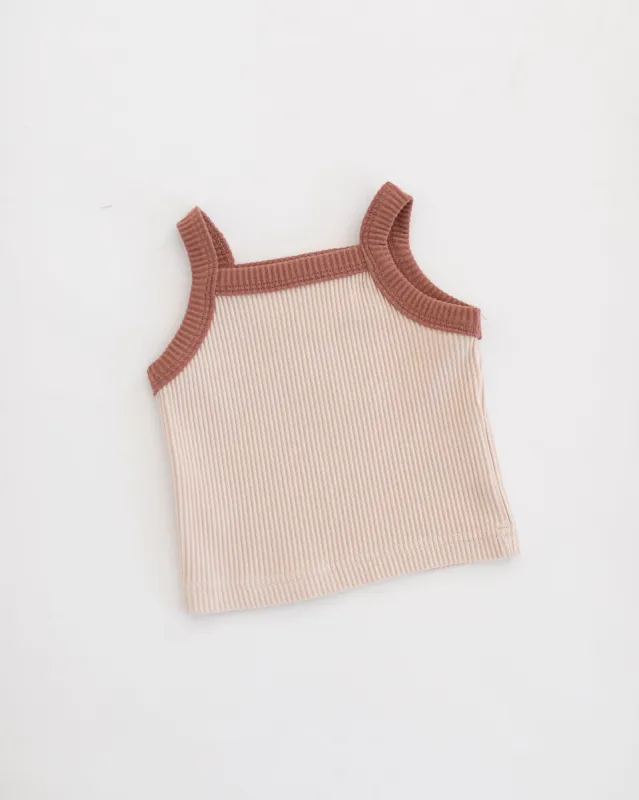 pink salt tank sold by Kindly