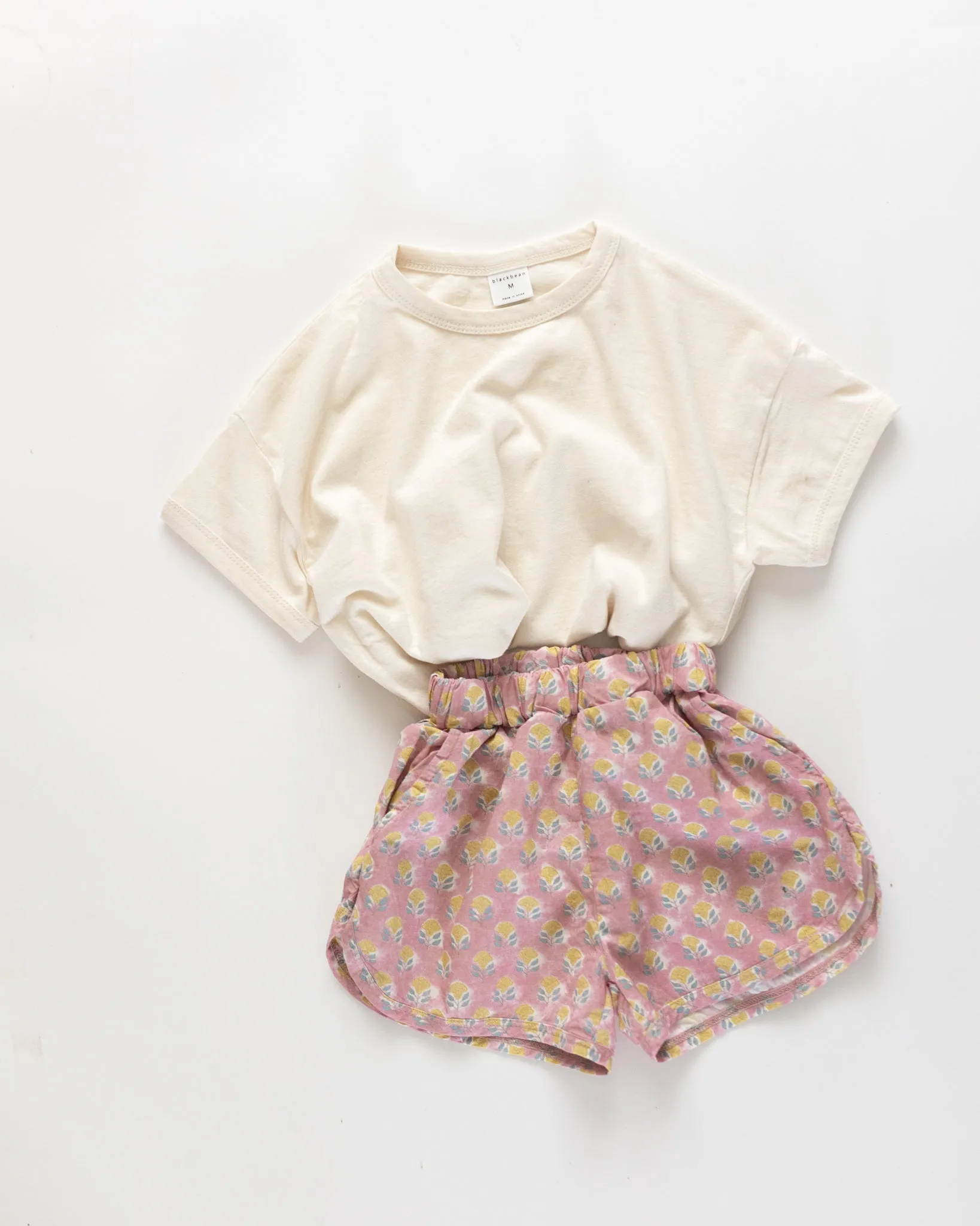 flowerbed shorts sold by Kindly