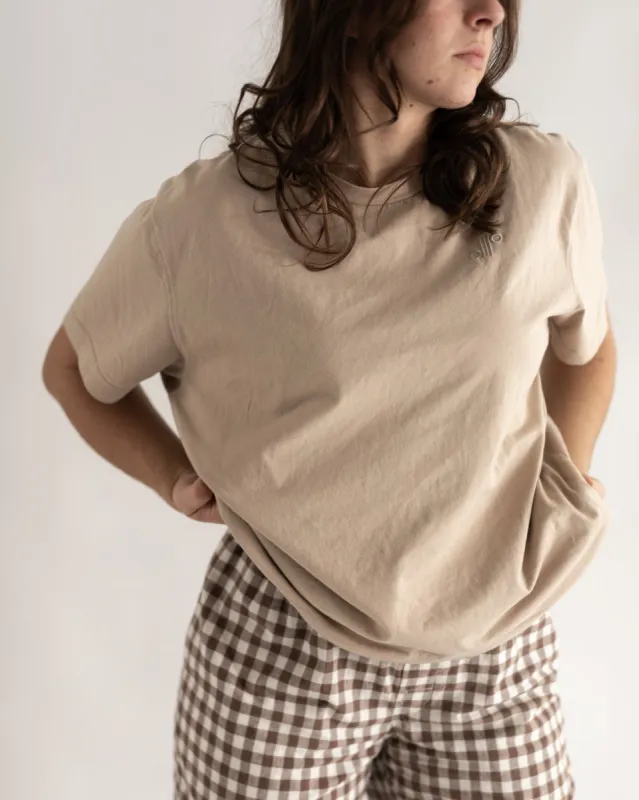 cotton logo tee sold by Kindly