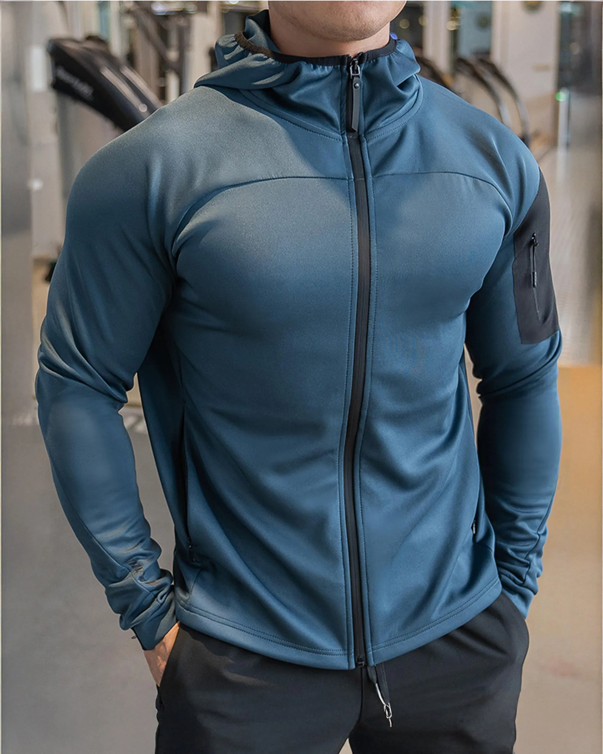 Arm Pocket Performance Hooded Jacket sold by Aha Selected