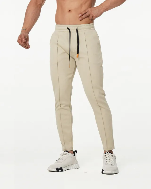 Pintuck Tapered Performance Sweatpants sold by Aha Selected