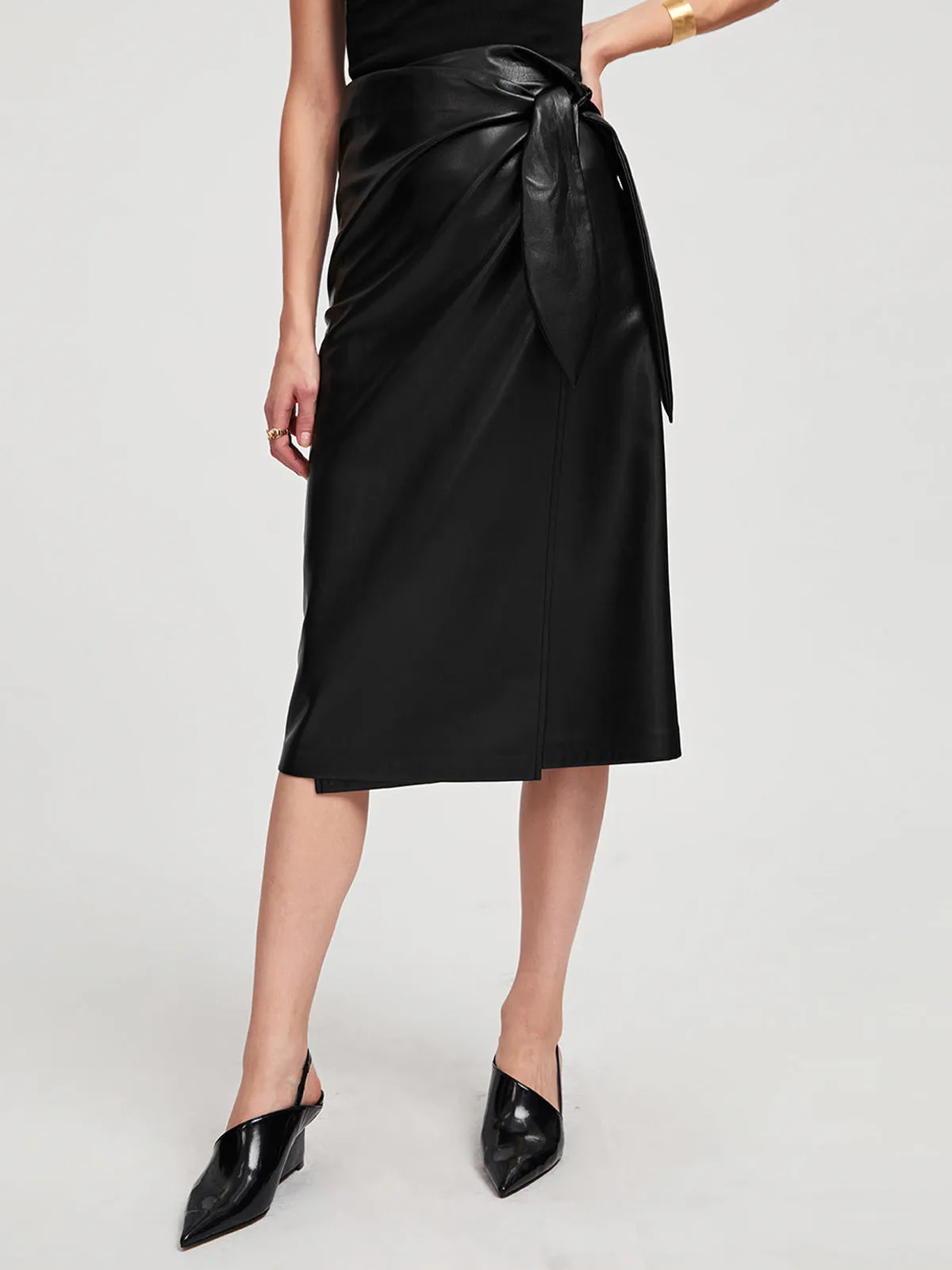 Black Long Wrap Vegan Leather Midi Skirt sold by Aha Selected
