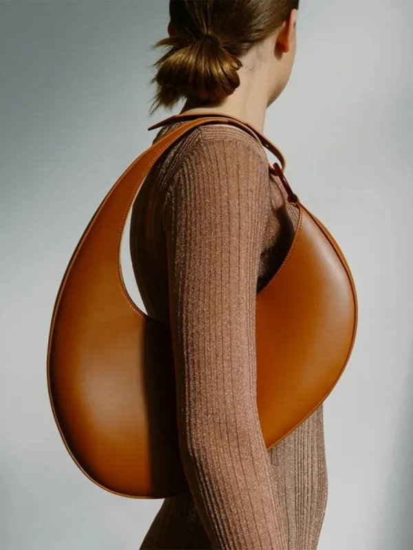Versatile Half Moon Shoulder Bag sold by Aha Selected
