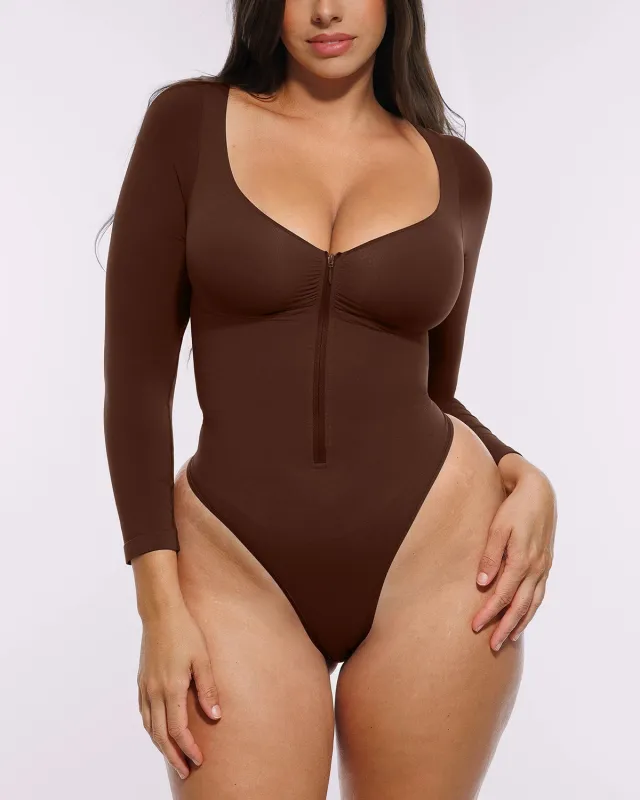 Bare Essentials™ Skin Flow™ Long Sleeve Zipper Front Thong Bodysuit sold by Shapellx