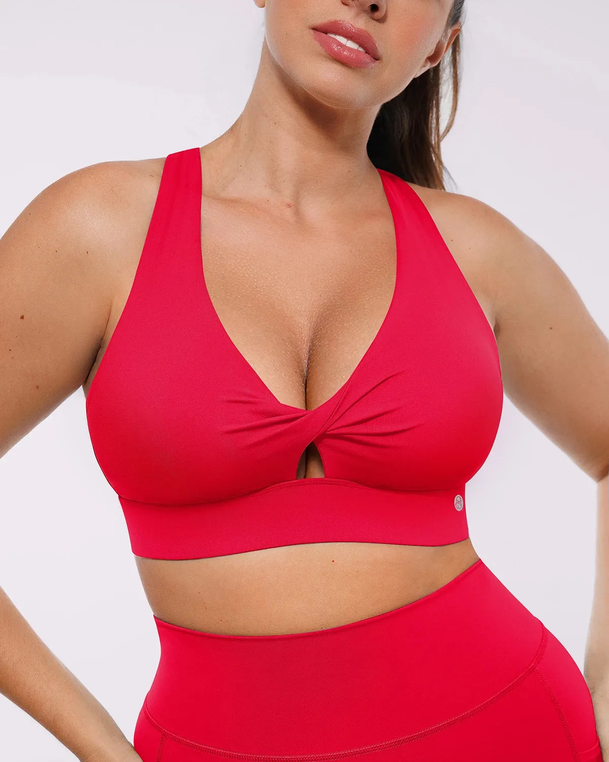 NeoSweat® AirSlim® Cutout Medium Impact Sports Bra sold by Shapellx