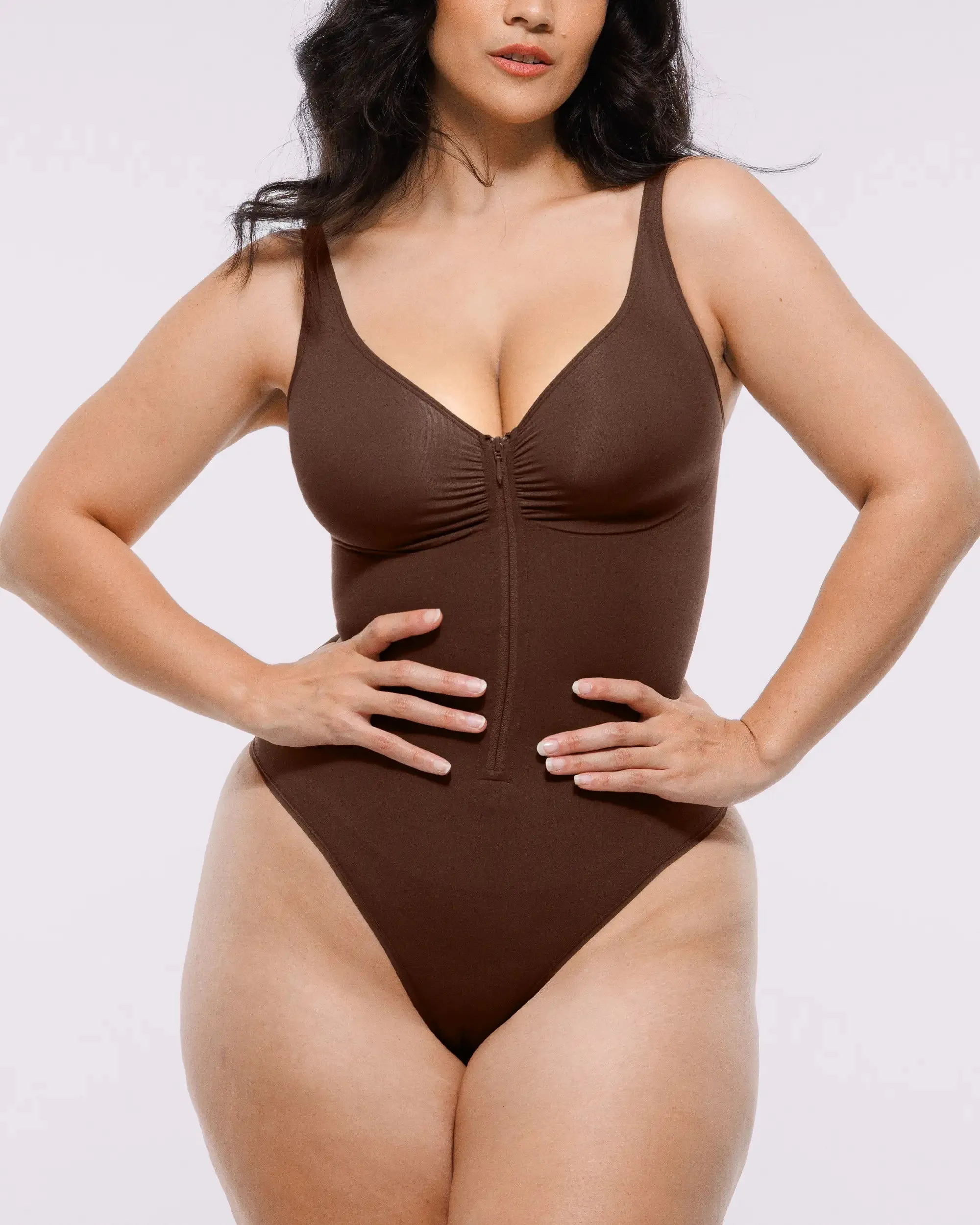 Bare Essentials™ Skin Flow Zipper Front Thong Bodysuit sold by Shapellx