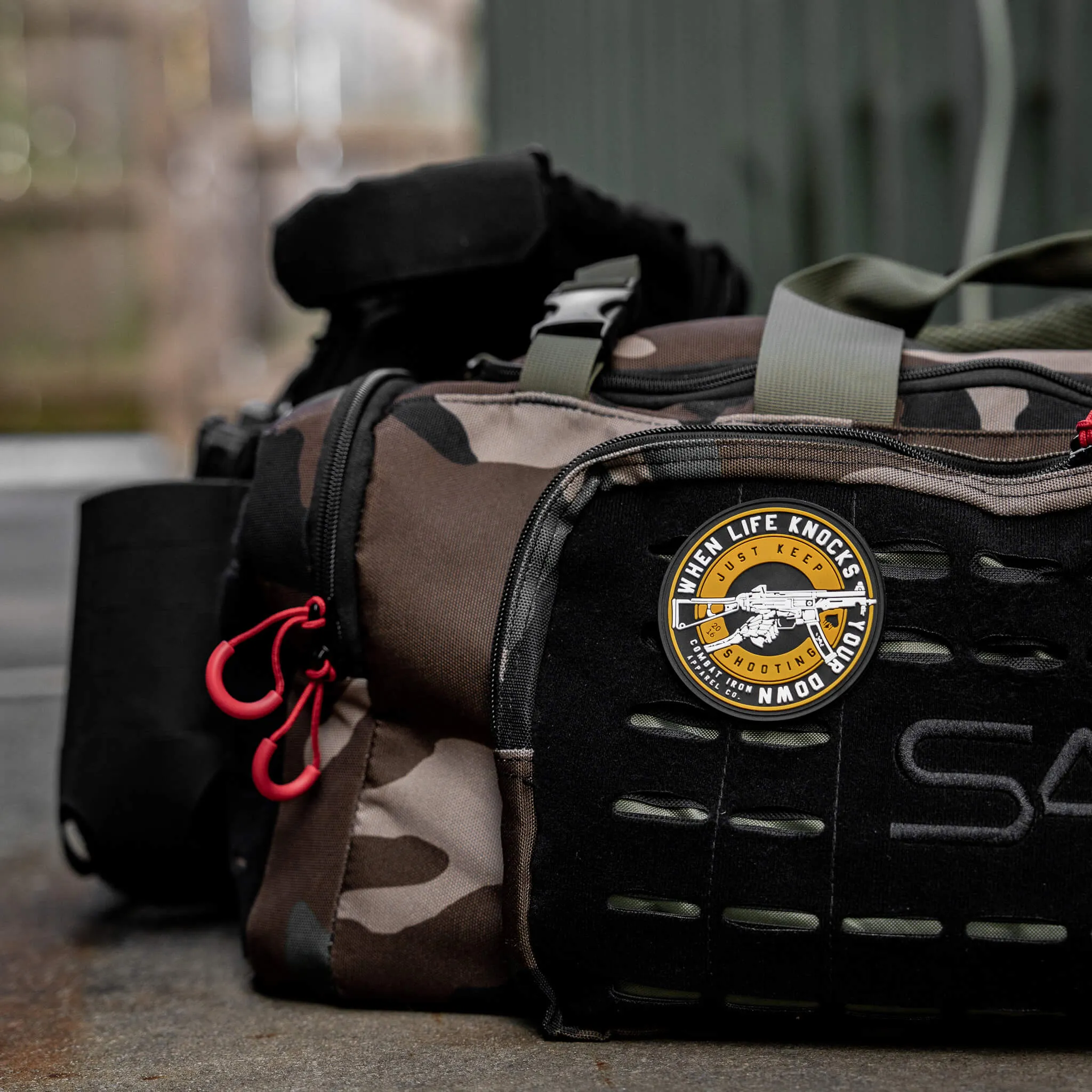 When Life Knocks You Down Just Keep Shooting PVC Patch sold by Combat Iron Apparel