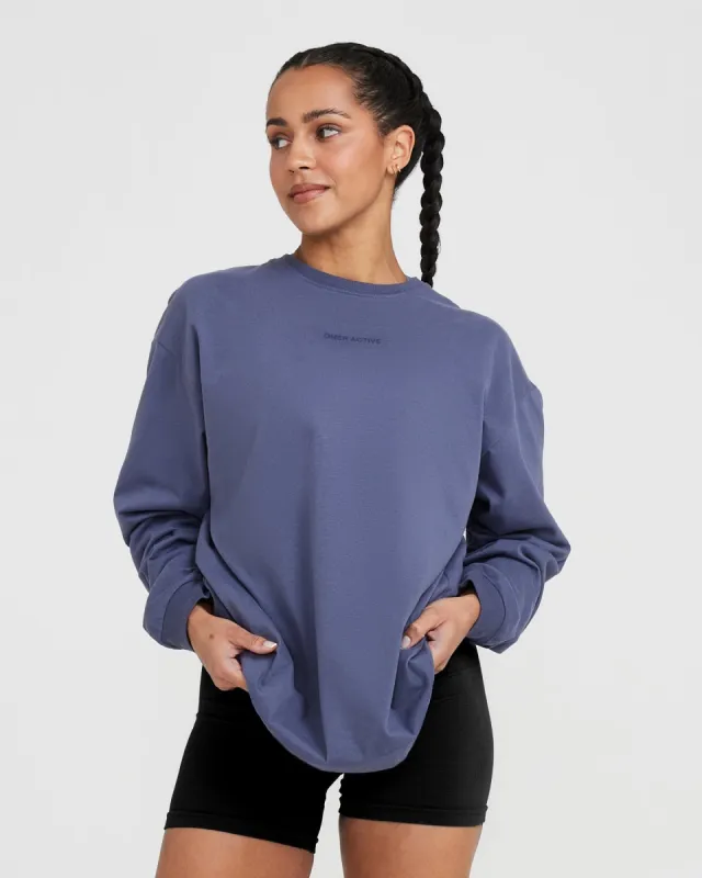 Classic Mirror Graphic Oversized Long Sleeve Top | Washed Slate Blue sold by Oner Active