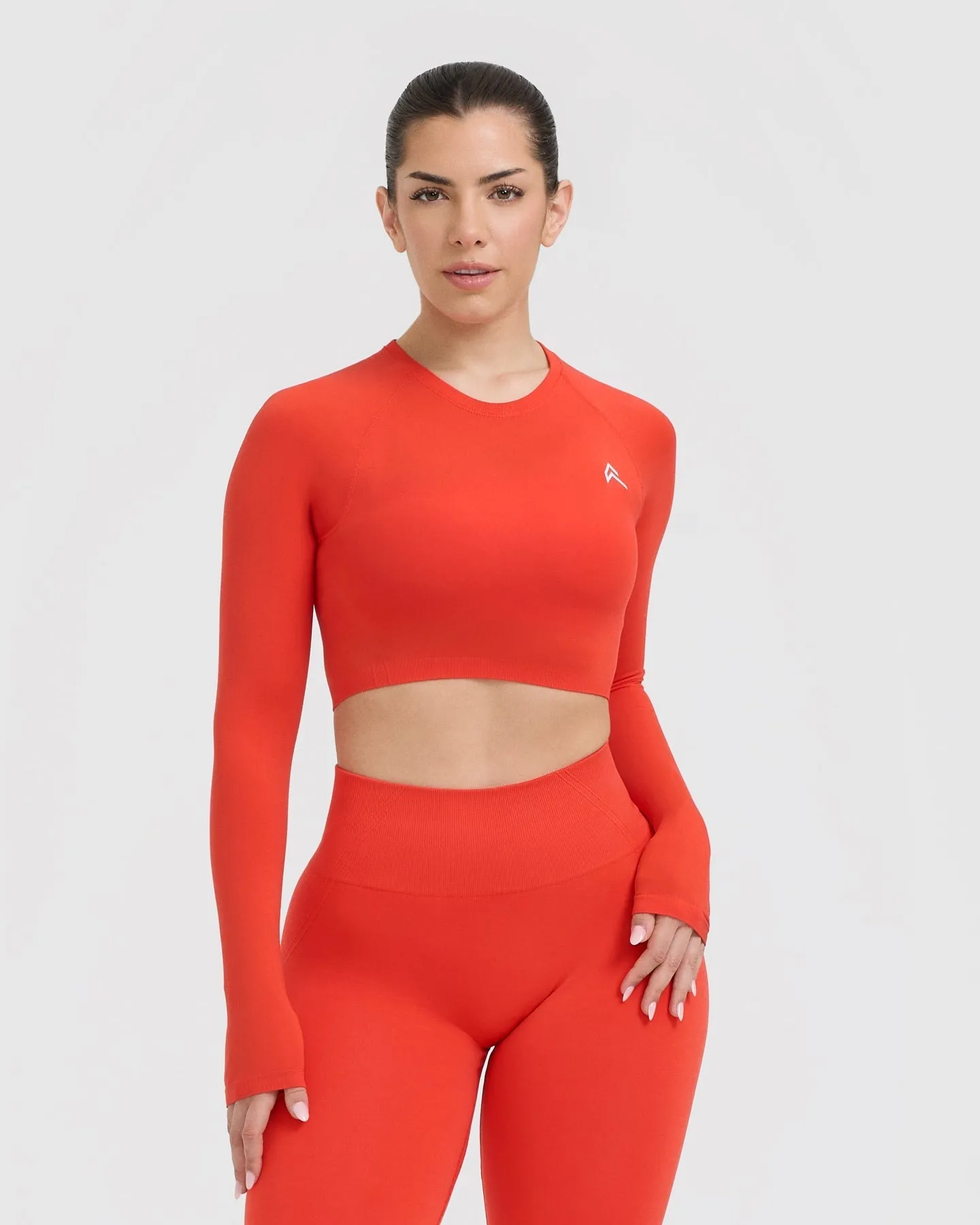 Go To Seamless Fitted Crop Long Sleeve Top | Charged Orange sold by Oner Active