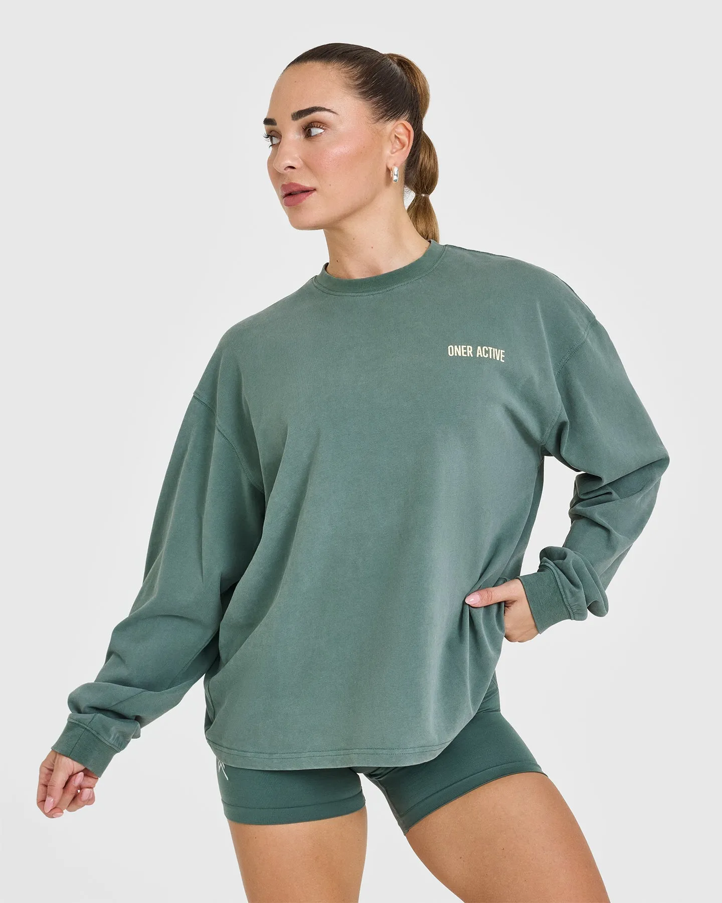 Oversized Graphic Washed Long Sleeve Top | Iced Green sold by Oner Active