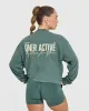 Oversized Graphic Washed Long Sleeve Top | Iced Green sold by Oner Active