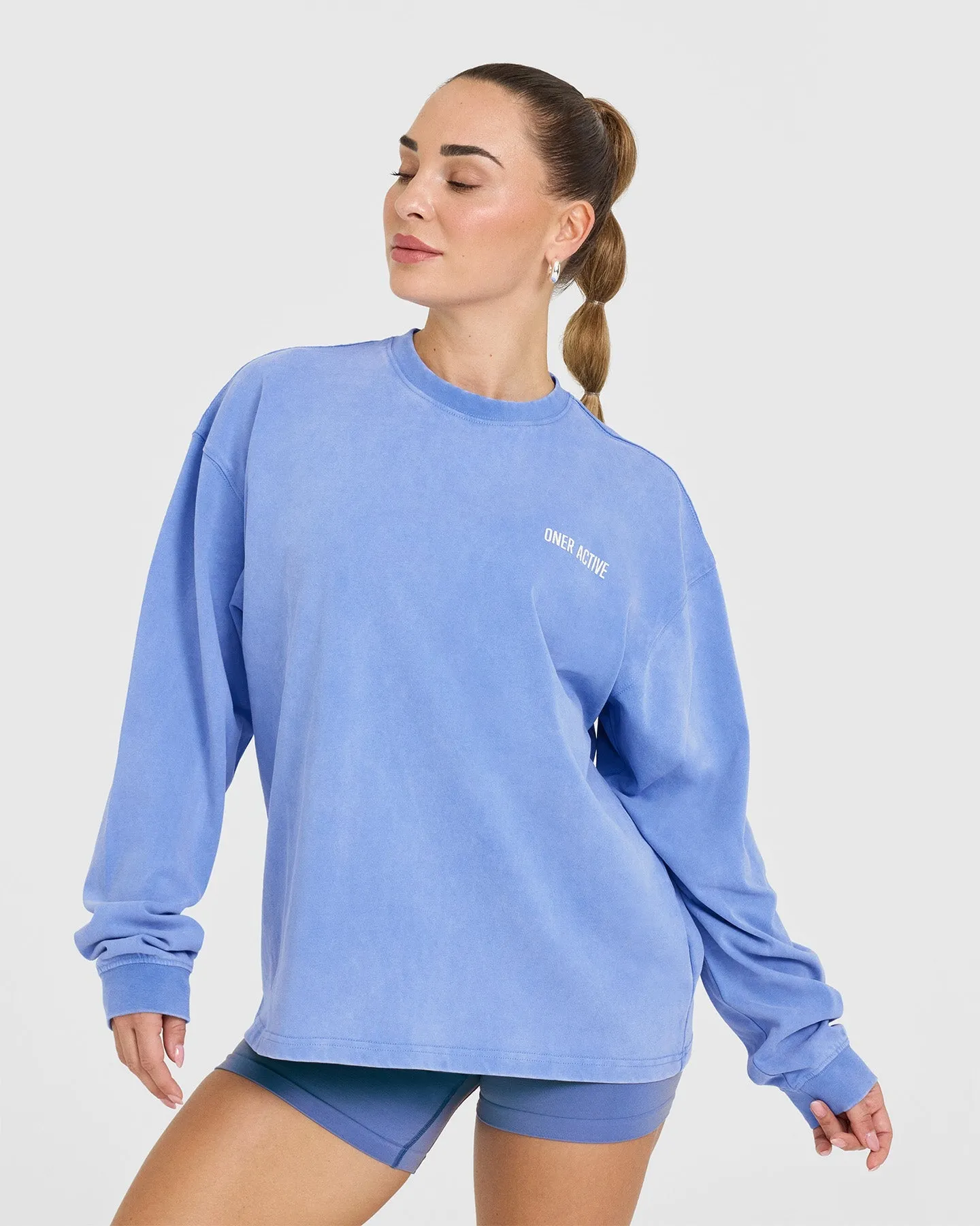 Oversized Graphic Washed Long Sleeve Top | Glaucous Blue sold by Oner Active