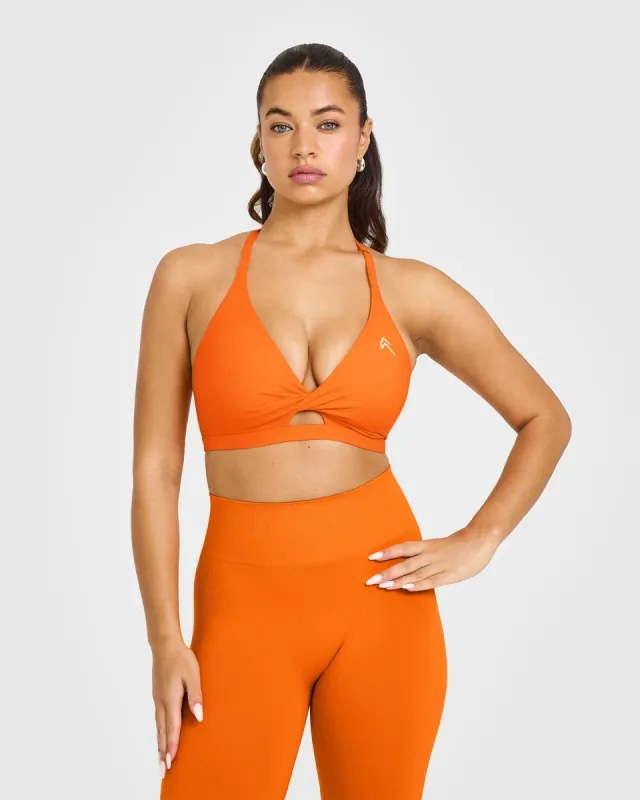 Unified Twist Sports Bra | Flame Orange sold by Oner Active