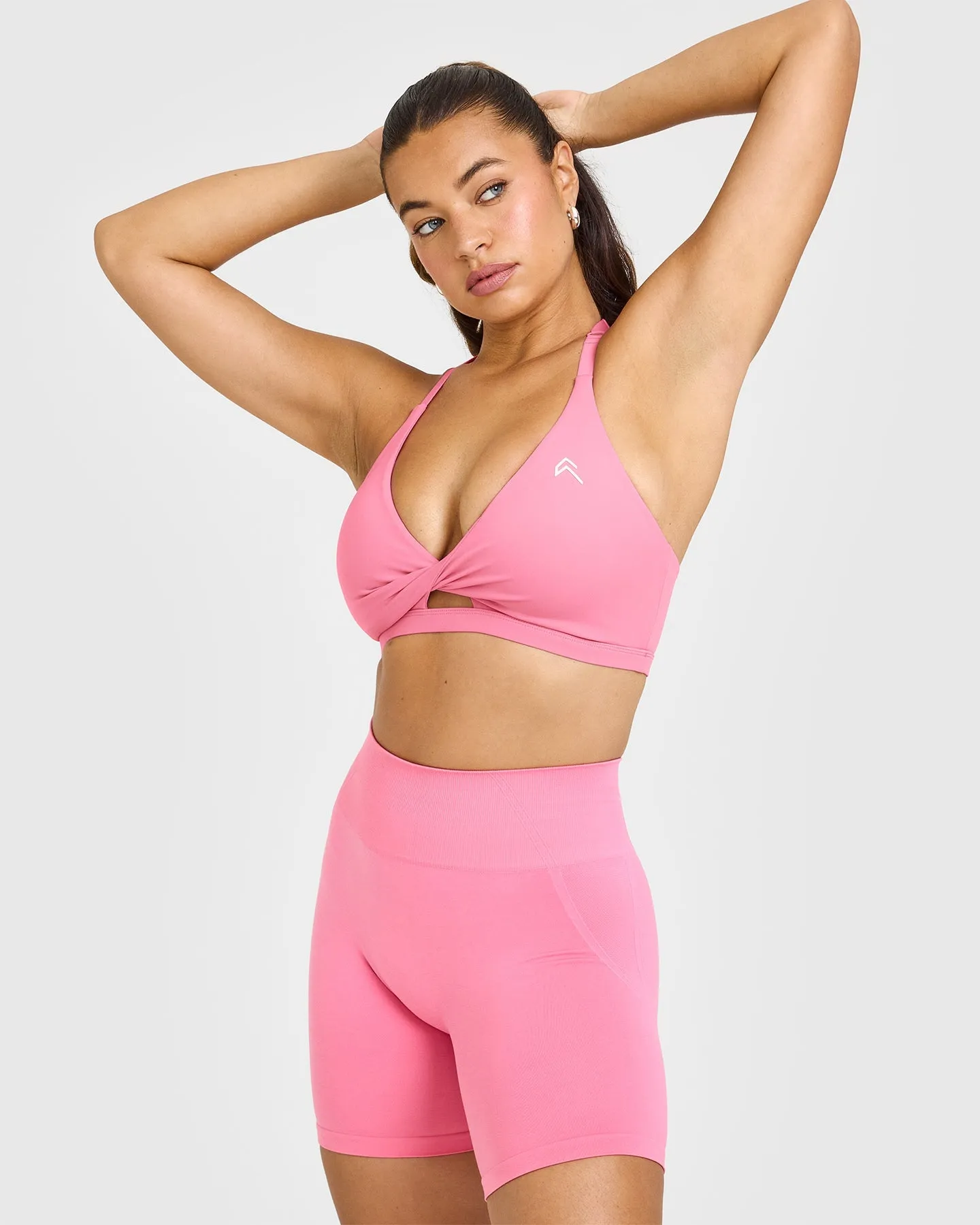 Unified Twist Sports Bra | Peony Pink sold by Oner Active