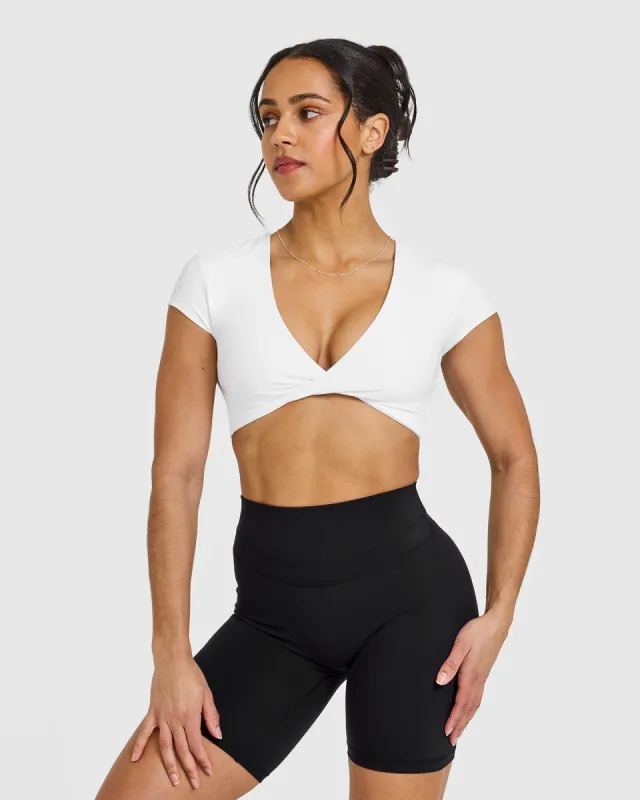 Unified Twist Front Short Sleeve Crop Top | White sold by Oner Active
