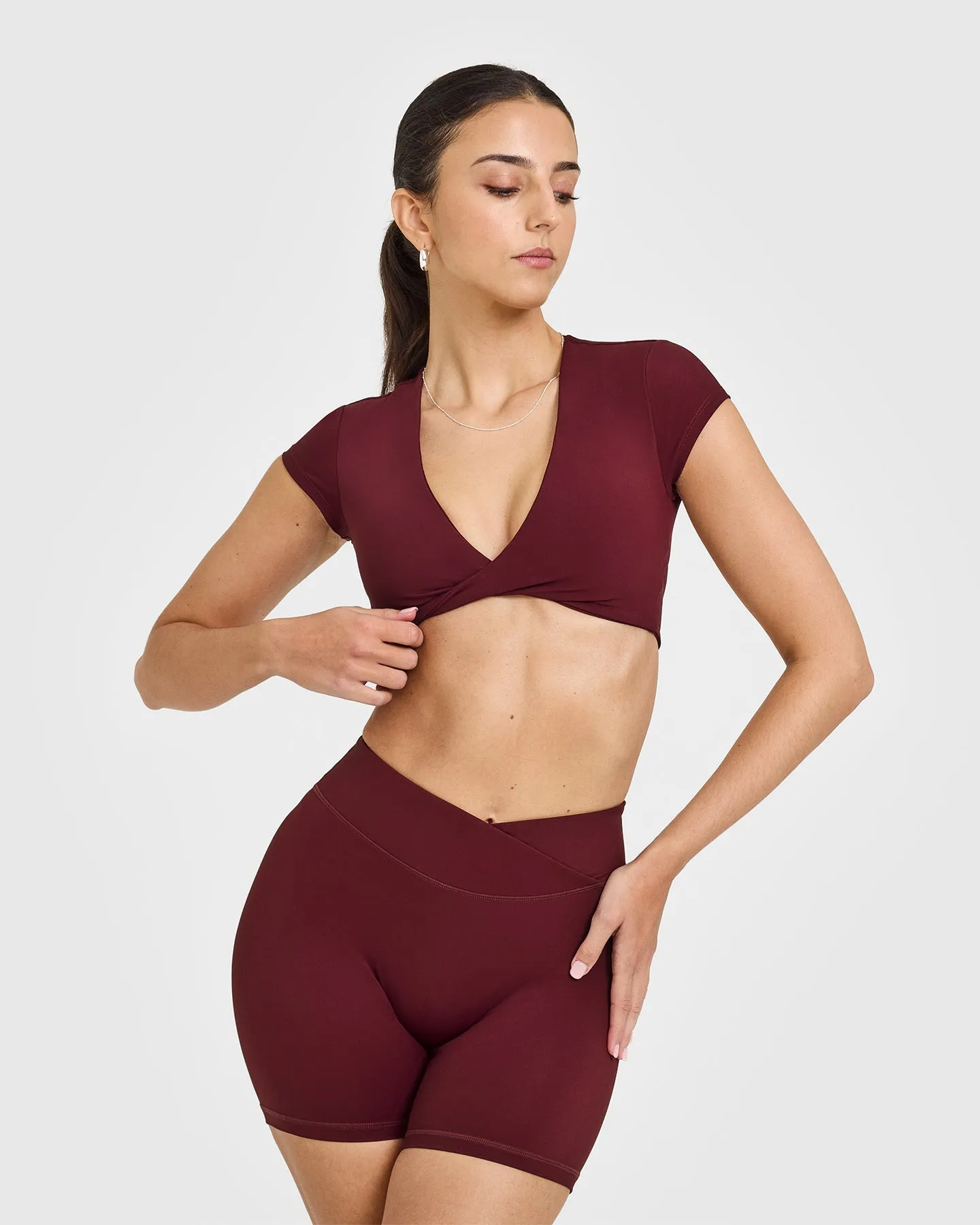 Unified Twist Front Short Sleeve Crop Top | Rosewood sold by Oner Active