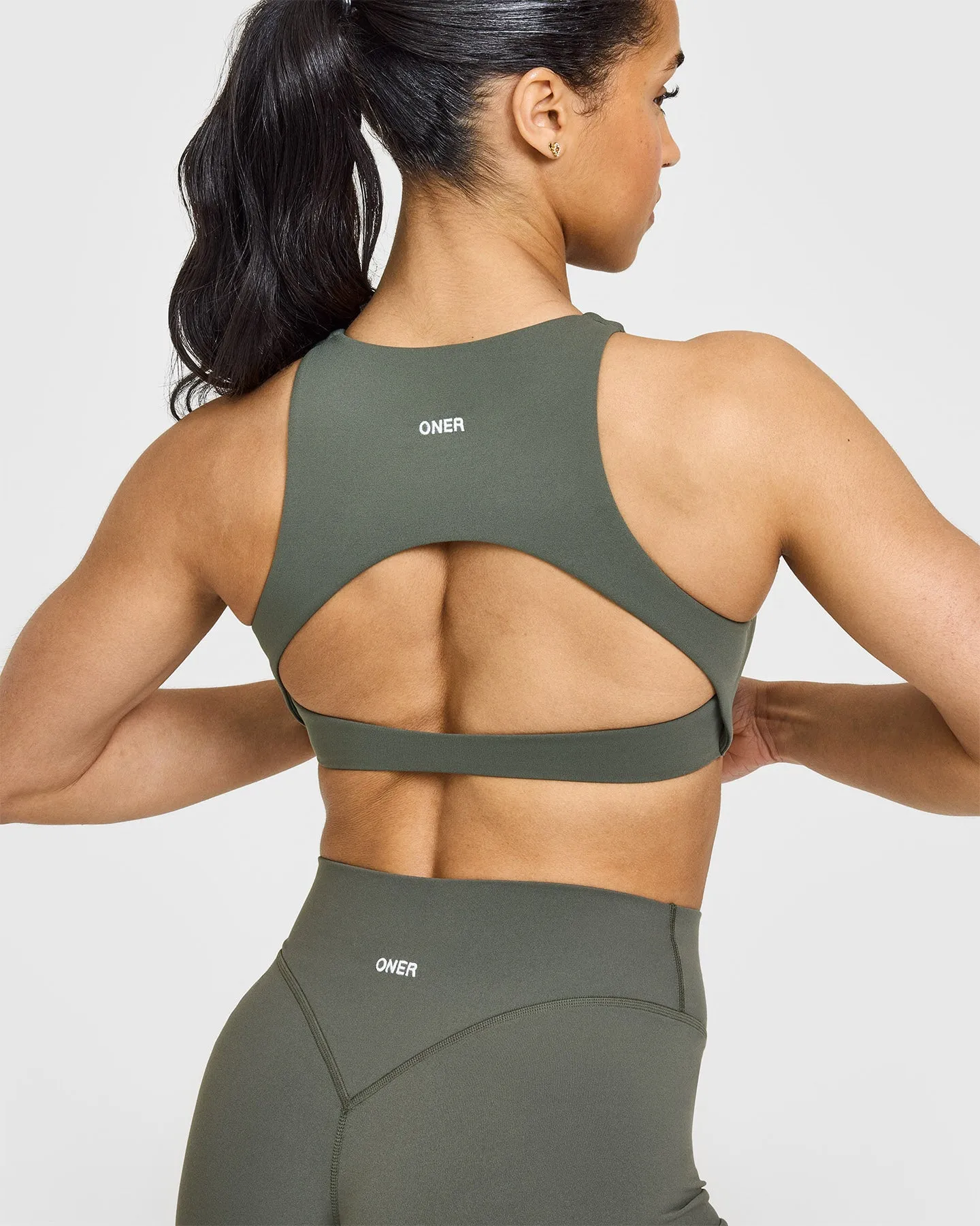SoftMotion™ High Neck Sports Bra | Dark Khaki sold by Oner Active product image thumbnail 4