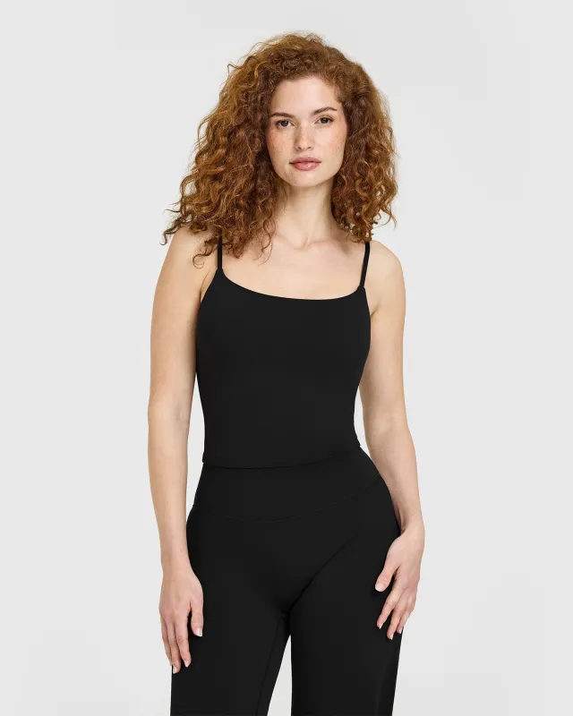 SoftMotion™ Strappy Mid Vest with Built in Bra Shelf | Black sold by Oner Active