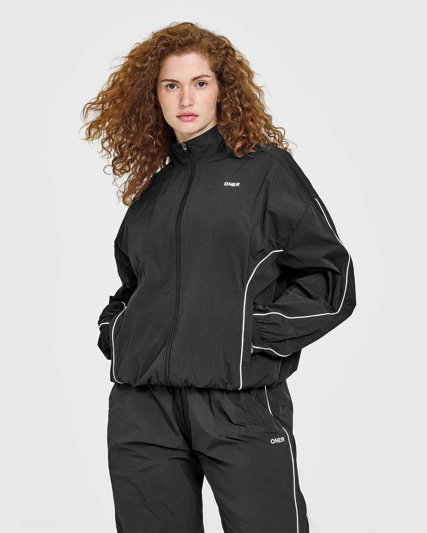 Oversized Piped Woven Track Jacket | Soft Black sold by Oner Active
