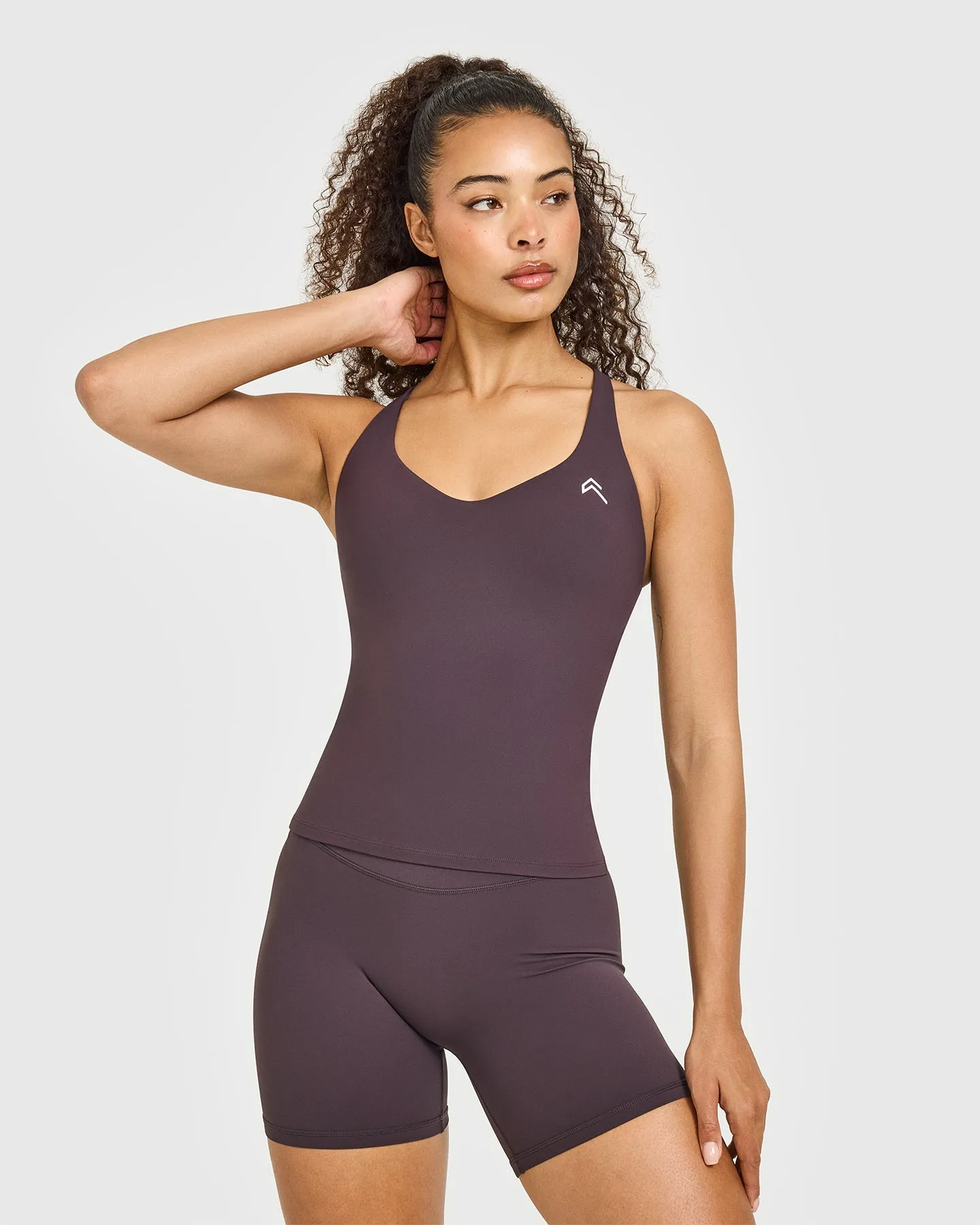 Unified V Neck Cross Back Vest | Dark Umber Brown sold by Oner Active