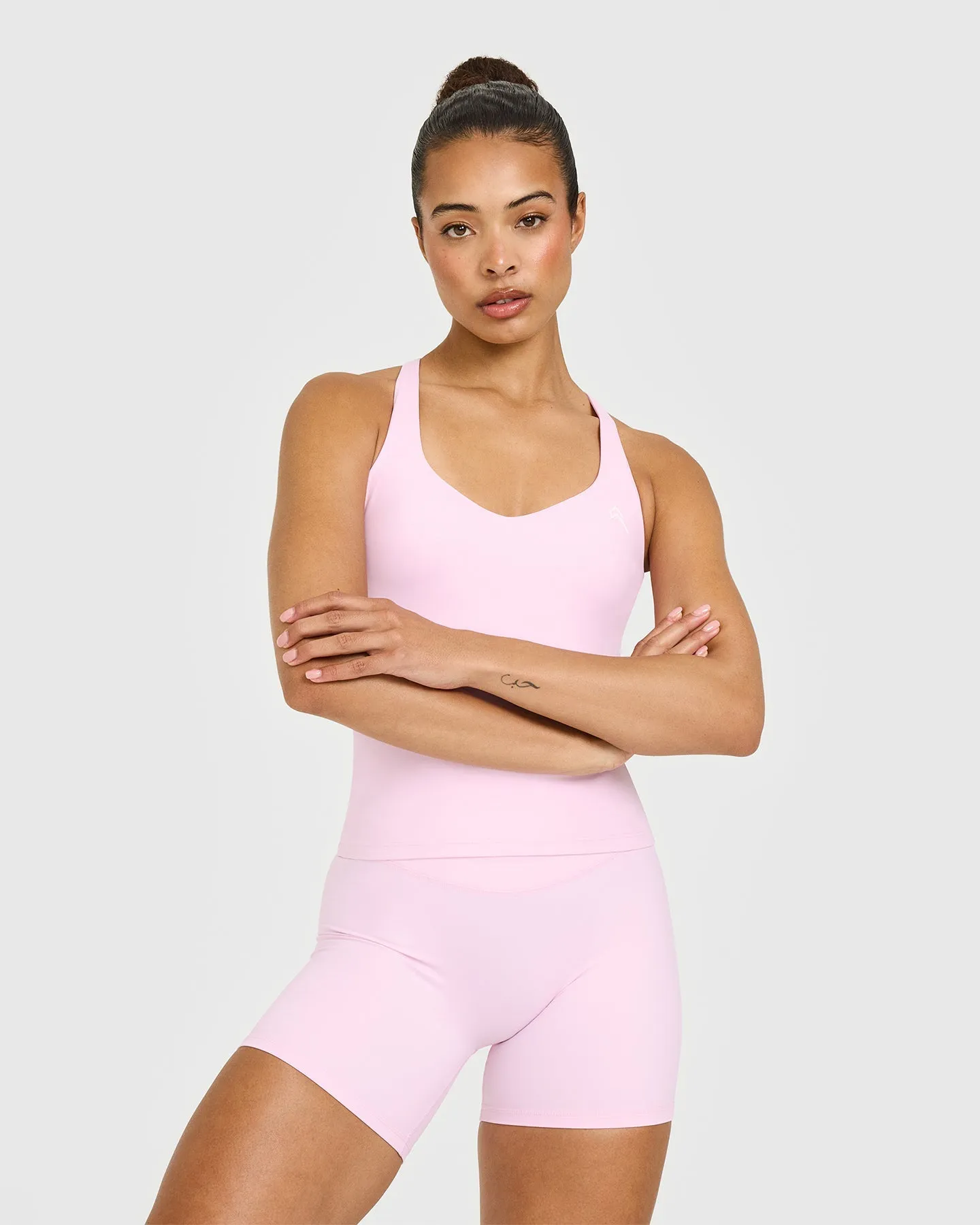Unified V Neck Cross Back Vest | Chalk Pink sold by Oner Active