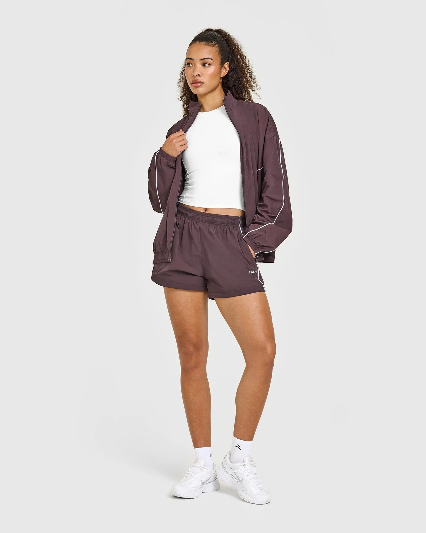 Oversized Piped Woven Track Shorts | Deep Umber Brown sold by Oner Active product image thumbnail 3