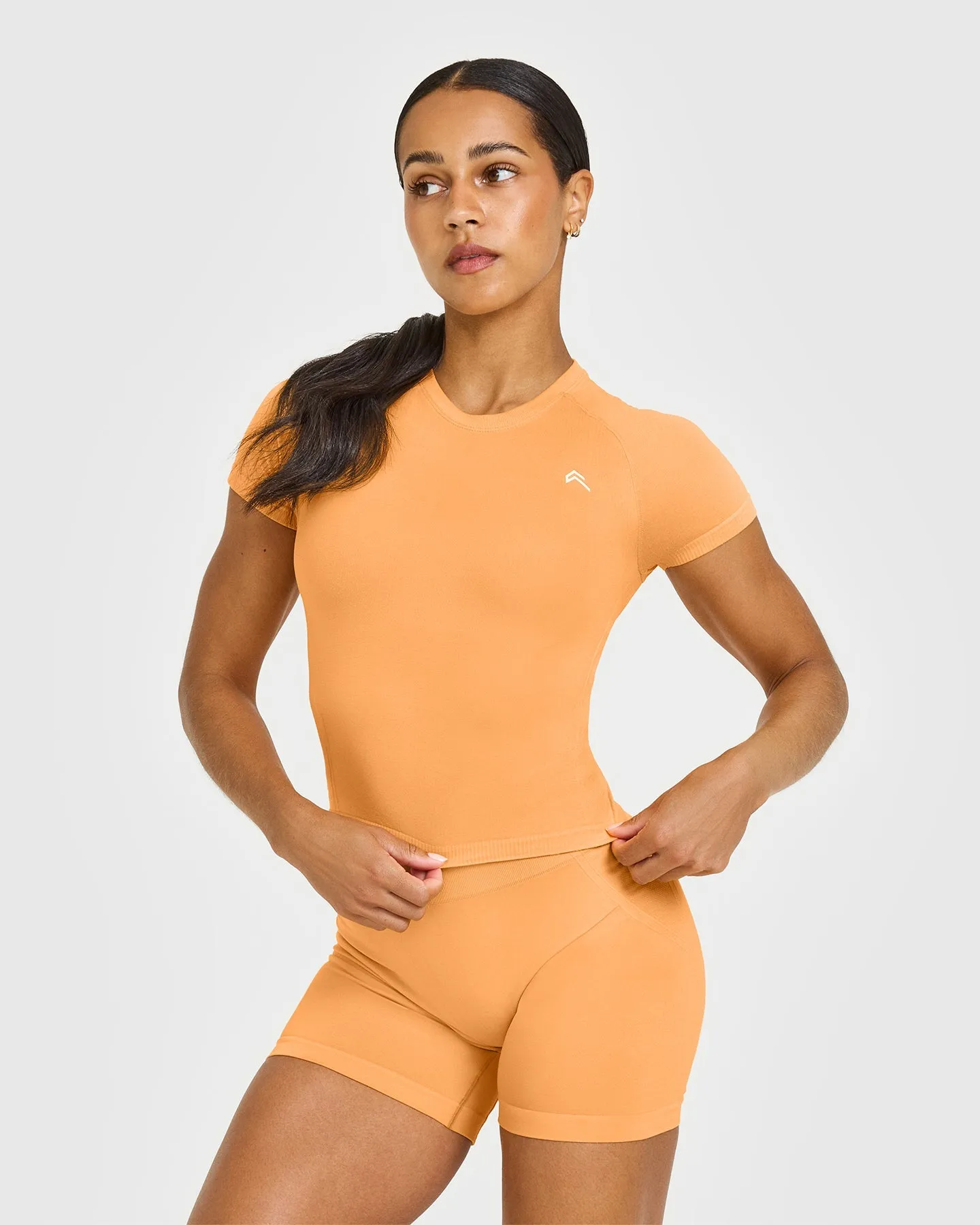 Go To Seamless Fitted Mid Top | Powdered Orange sold by Oner Active