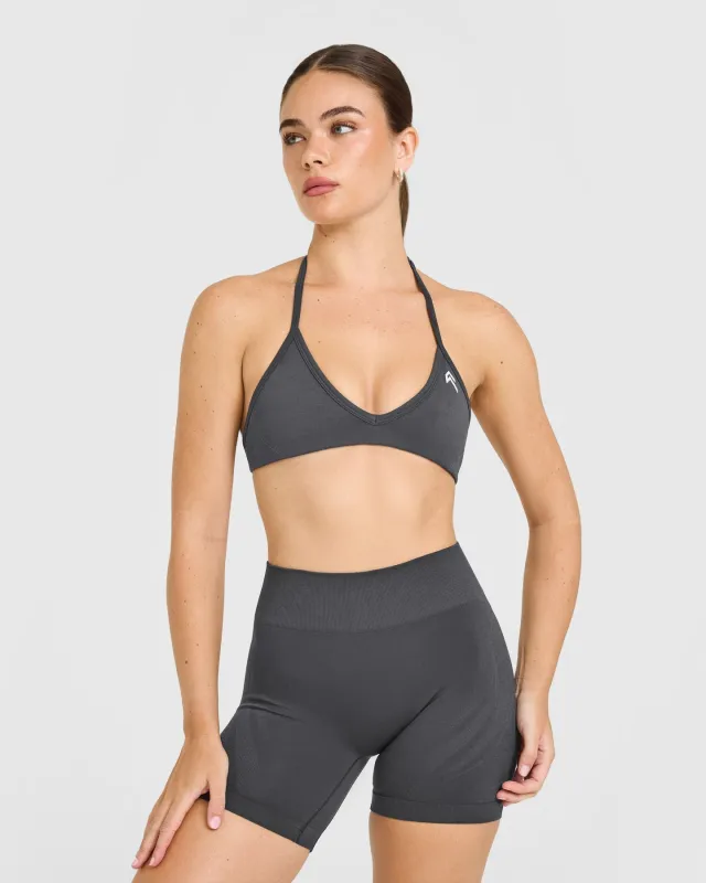 EnhanceLift™ Seamless Minimal Halter Neck Bralette with White Logo | Coal sold by Oner Active