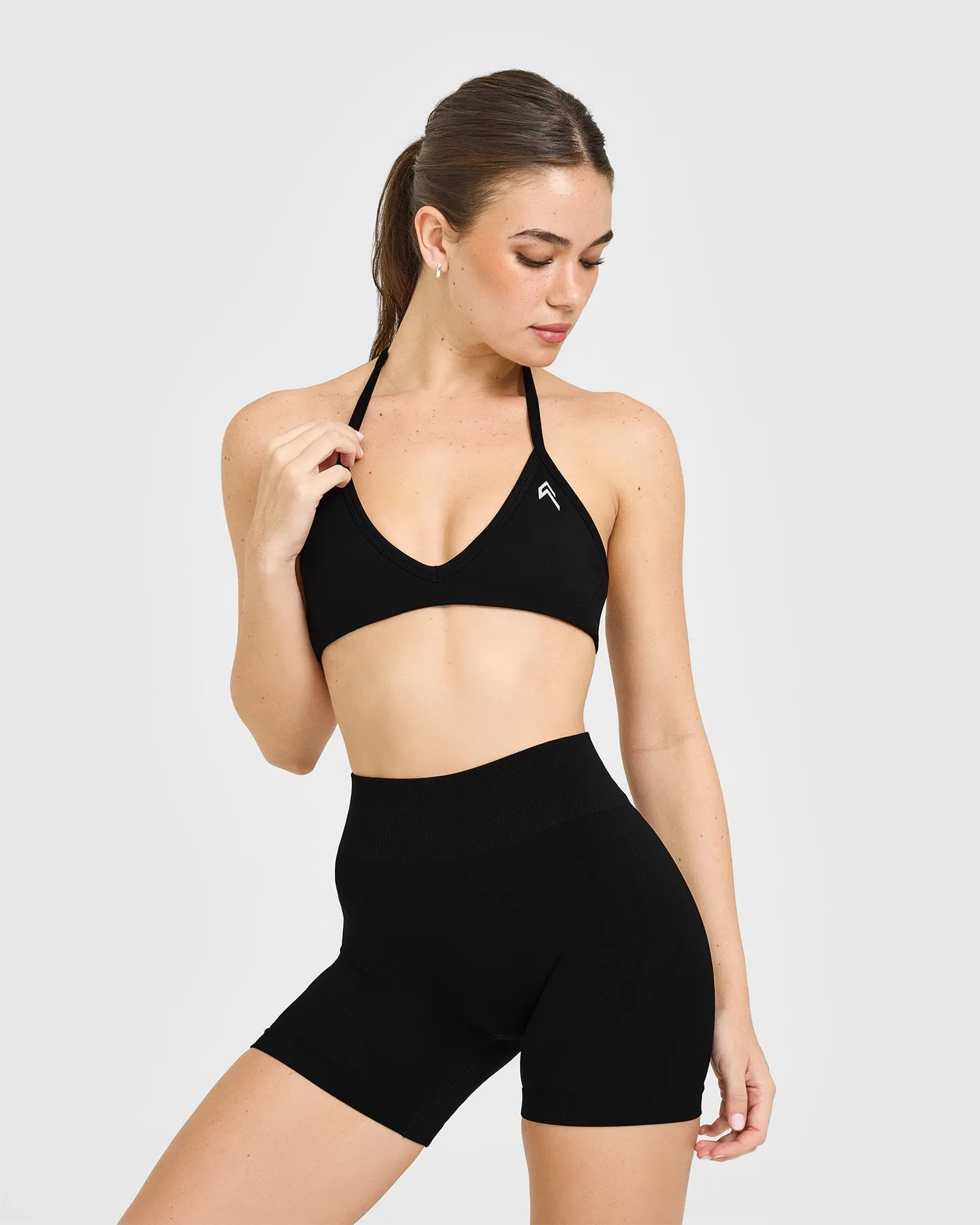 EnhanceLift™ Seamless Minimal Halter Neck Bralette with White Logo | Black sold by Oner Active product image thumbnail 2
