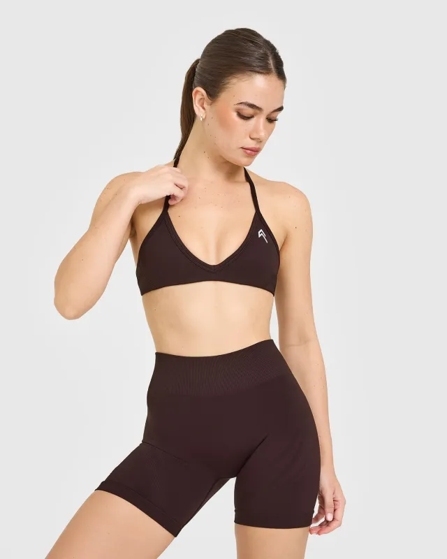 EnhanceLift™ Seamless Minimal Halter Neck Bralette with White Logo | Plum Brown sold by Oner Active